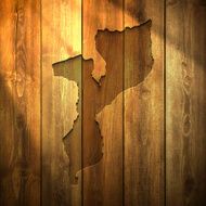 Mozambique Map on lit Wooden Background
