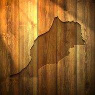 Morocco Map on lit Wooden Background