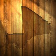 Mali Map on lit Wooden Background