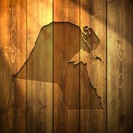 Kuwait Map on lit Wooden Background