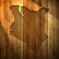 Kenya Map on lit Wooden Background