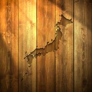 Japan Map on lit Wooden Background