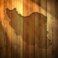 Iran Map on lit Wooden Background
