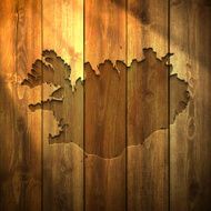 Iceland Map on lit Wooden Background
