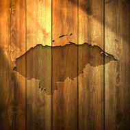 Honduras Map on lit Wooden Background