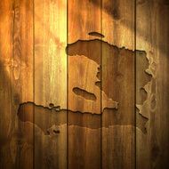 Haiti Map on lit Wooden Background