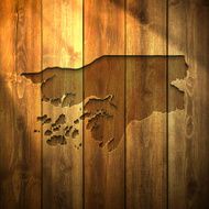 Guinea-Bissau Map on lit Wooden Background