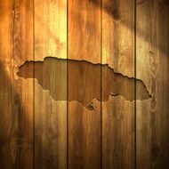 Jamaica Map on lit Wooden Background