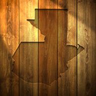 Guatemala Map on lit Wooden Background