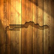 Gambia Map on lit Wooden Background