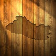 El Salvador Map on lit Wooden Background