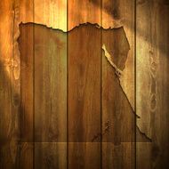 Egypt Map on lit Wooden Background