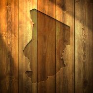 Chad Map on lit Wooden Background