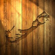 Bermuda Map on lit Wooden Background