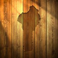 Benin Map on lit Wooden Background