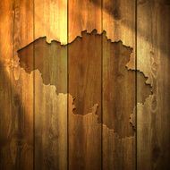 Belgium Map on lit Wooden Background