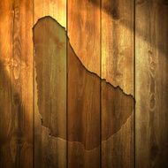 Barbados Map on lit Wooden Background