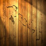 Bahamas Map on lit Wooden Background