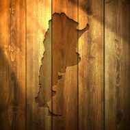Argentina Map on lit Wooden Background