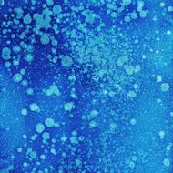 Aqua blue hand painted background with splattered texture
