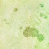Pale yellow and green textured background