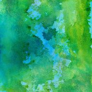 Watercolor and ink textured background in blue green