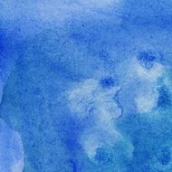 Blue watercolor background with paint movement