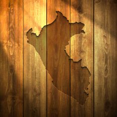 Peru Map on lit Wooden Background