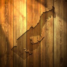 Monaco Map on lit Wooden Background