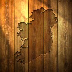 Ireland Map on lit Wooden Background