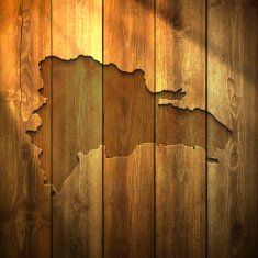 Dominican Republic Map on lit Wooden Background