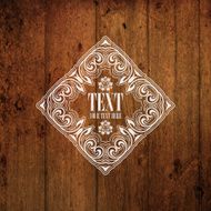 Decorative frame on grunge wood background