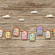 Colorful homes on wooden background