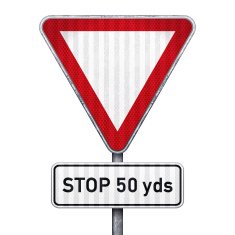 Triangular road sign with 50 yards ahead to stop N2