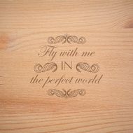 timber wallpaper with engraving quote label