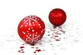 red balls with a pattern on the stars