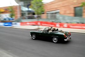 convertible moves on the road