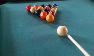 breaking balls on a pool table