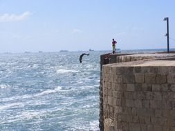 cliff jump into ocean