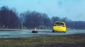 yellow car on driving training ground