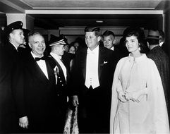 president john f kennedy with wife walking on inaugural ball