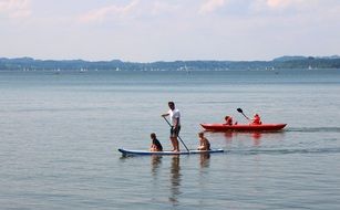 paddle surfing on the lake