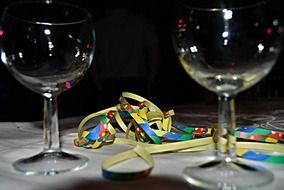 glasses and confetti on the table