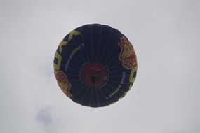 hot air balloon on the cloudy sky