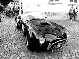 black and white photo of a racing car