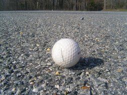 golf ball on road