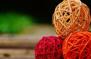 three decorative wooden balls