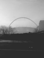 distant view of Wembley Stadium in black and white image