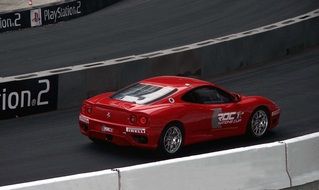 red sports car on the track