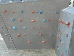 climbing wall sport with colorful holds